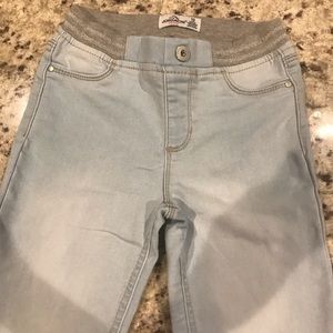 Girls size 10 blue jeans. Waisted with grey band. Stone washed